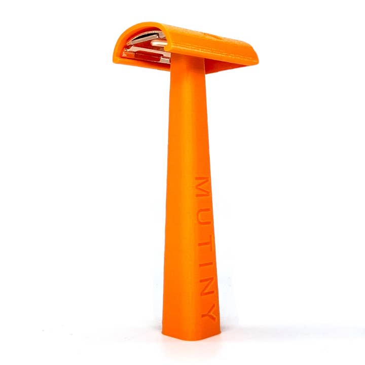 Bouclier de lame orange assorti pour la vente par Mutiny Shaving