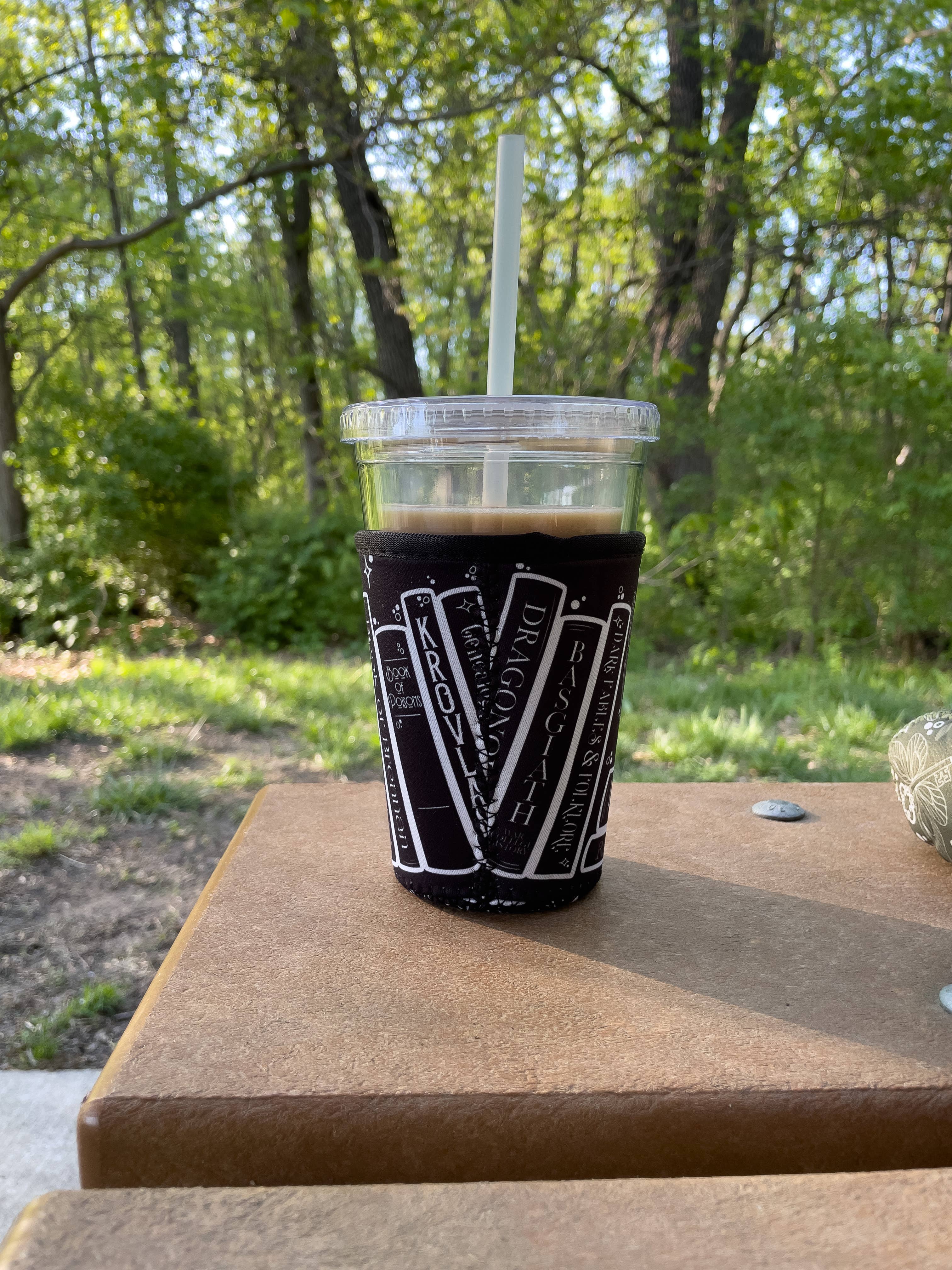 Meaggie Moos - Wholesale Drink Huggers & Koozies - 16oz Drink Sleeve | Fourth Wing Violet's Bookshelf4