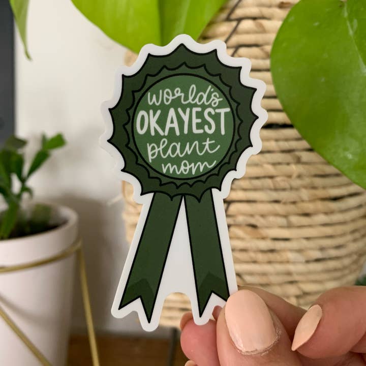 World's Okayest Plant Mom Ribbon Sticker for wholesale by Clay Collection Co.