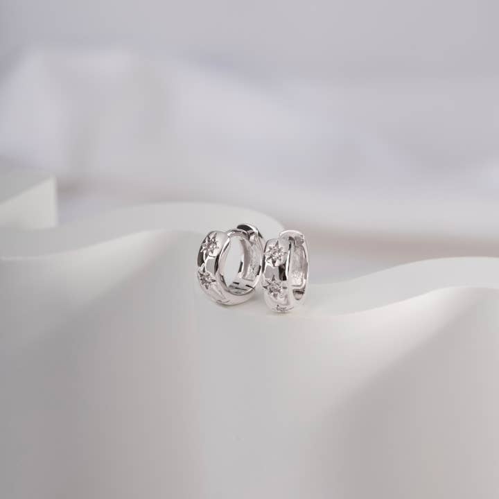 Constellation Silver 7mm Baby Huggie Earrings for wholesale by Wanderlust + Co