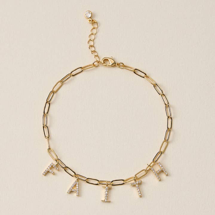 Pulsera con dije de fe bañada en oro y circonita cúbica para venta al por mayor de Frem