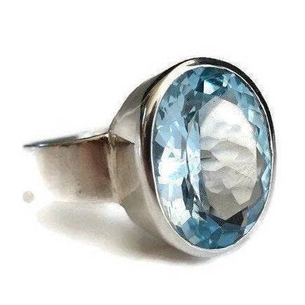 Högkvalitativ oval blå topasring | 925 sterlingsilver, R113B för wholesale av Mistry Gems