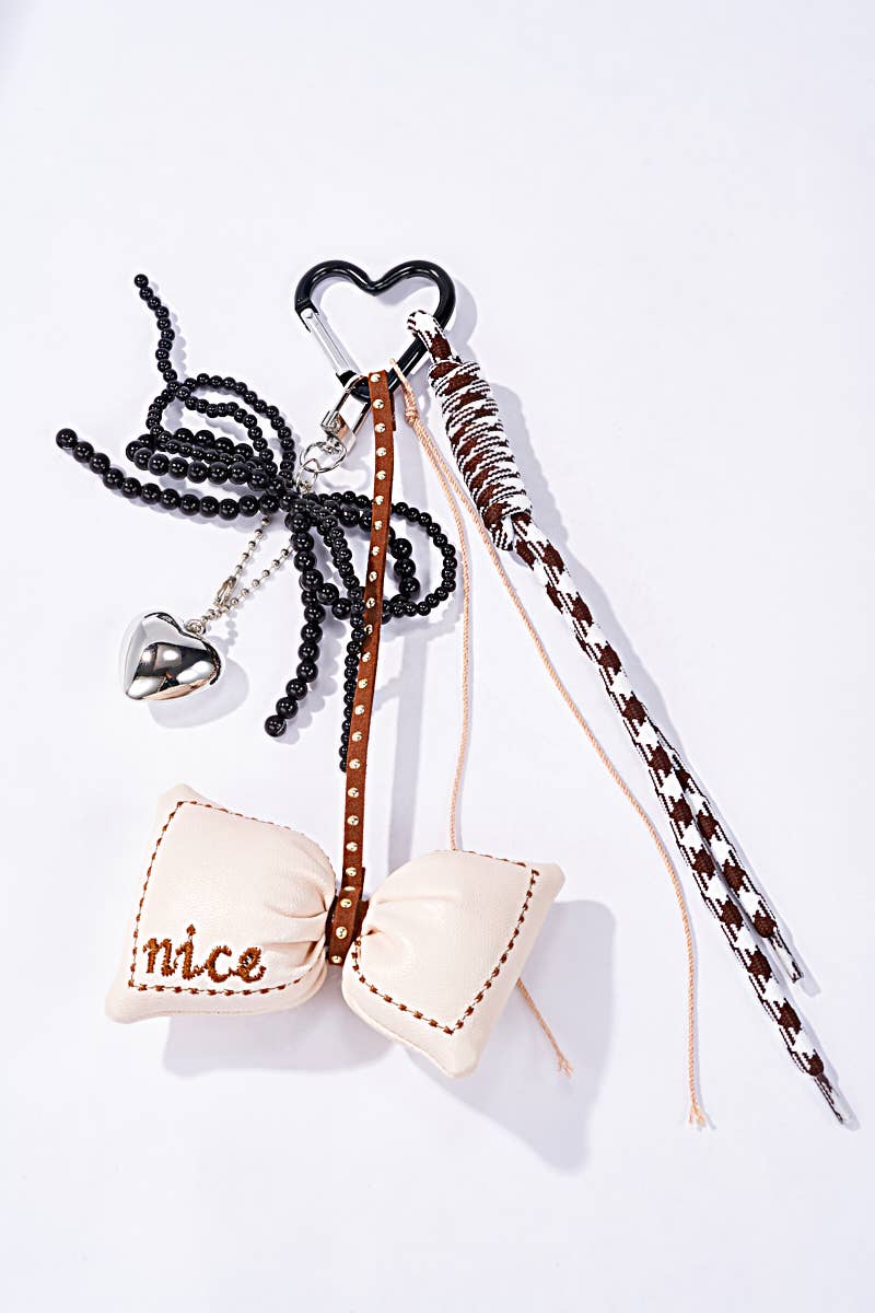 Beige Grigri bag accessories and keychain Nice PC50 for wholesale on Faire