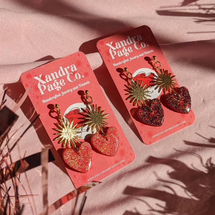Xandra Page Co. - Wholesale Dangle Earrings - Sacred Heart Sunburst Earrings | Polymer Clay Charm Heart