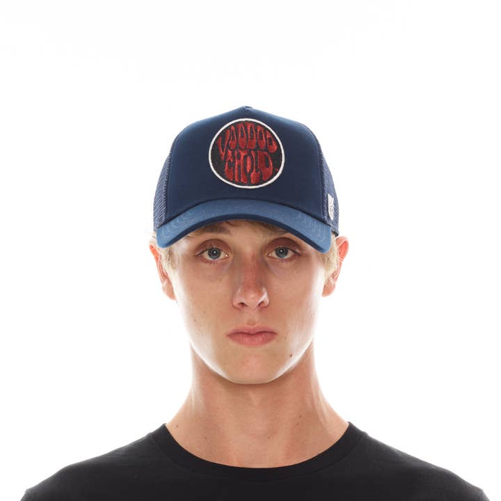 HENDRIX MESH BACK TRUCKER CURVED VISOR IN NAVY for wholesale by Cult of Individuality