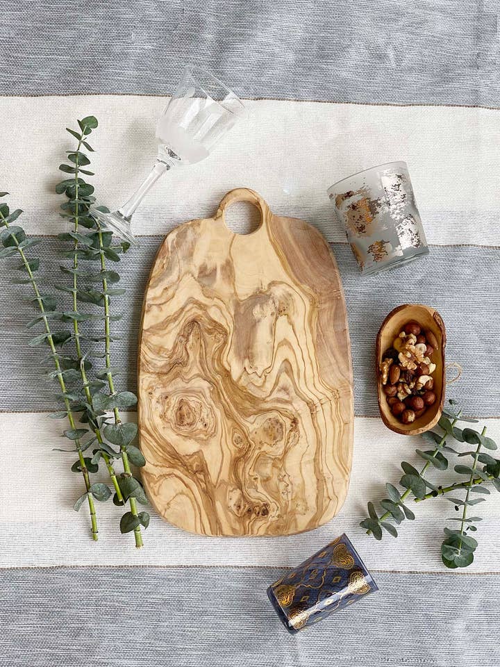 Olive Wood Medium Cutting Board with Hole for wholesale by Scents and Feel