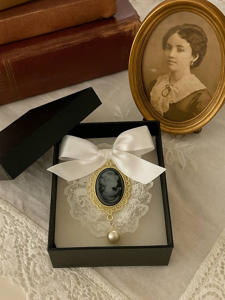 Brooch with a Victorian-inspired cameo for wholesale by Wild & Free