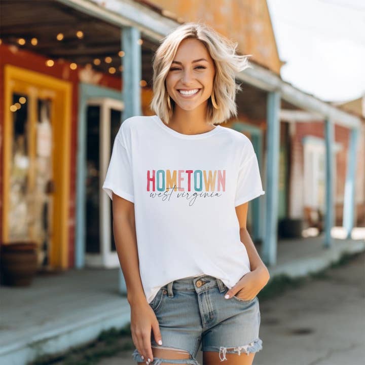 white Bella Canvas T-Shirt White-Watercolor City Hometown Laurel for wholesale on Faire