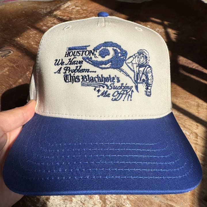 ‘Sort Hul Suger Mig Af’ Hat for engroshandel hos Freddy Tyler Paul