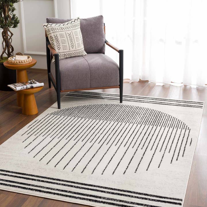 Angus Abstract Black and White Area Rug for wholesale by Hauteloom
