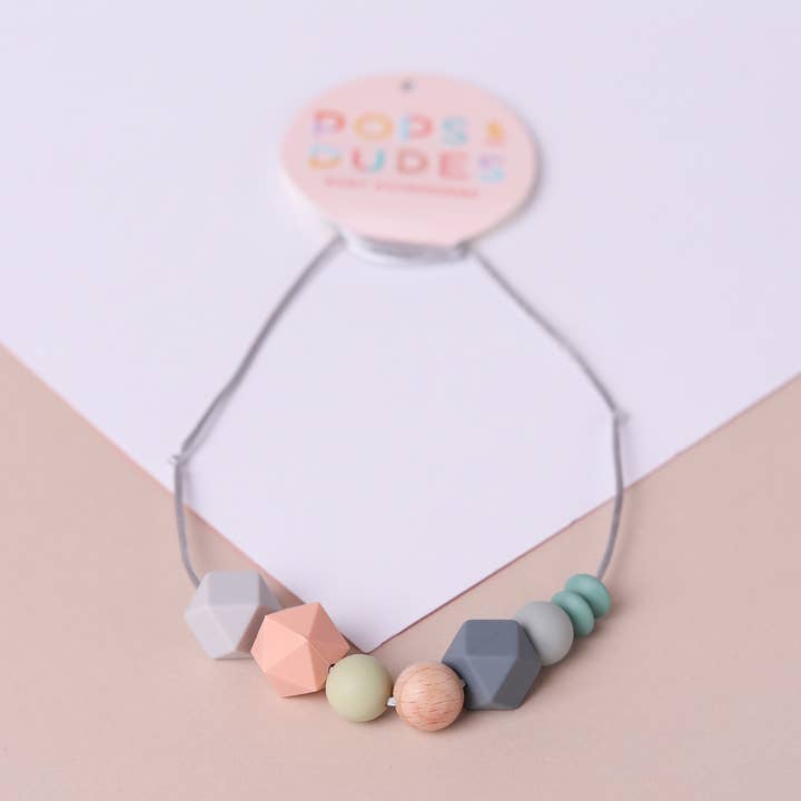 Collier de dentition pop pêche pour la vente par Pops and Dudes