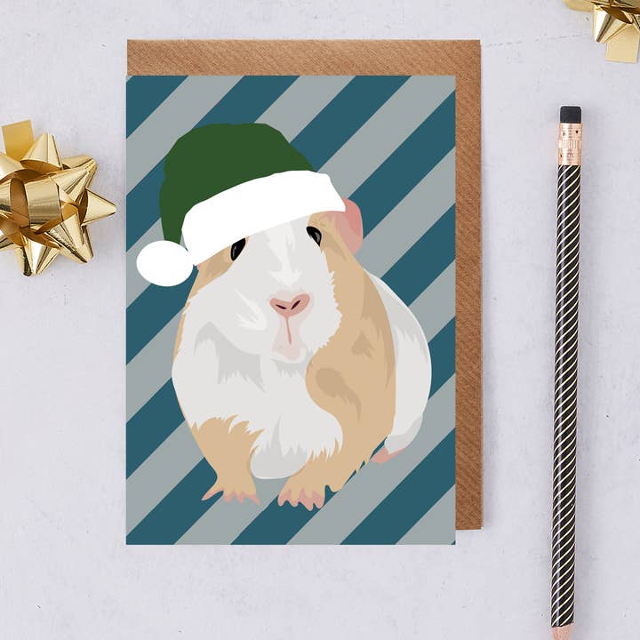 Weihnachtskarte mit illustriertem Meerschweinchen mit Weihnachtsmütze für den Großhandel von Lorna Syson