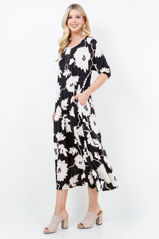 Zwart ZWARTE BLOEMENJURK MET ZIJZAKKEN PLUS SIZE MIDIJURK SAMD7005XF voor groothandel op Faire2