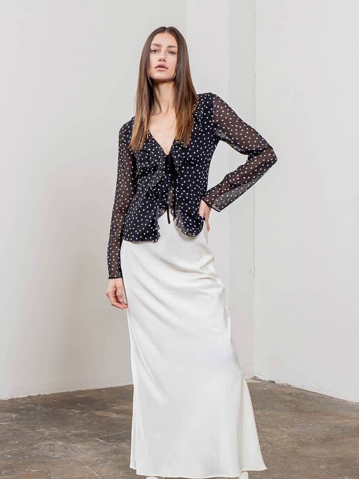 BLACK POLKA DOT RUFFLE FRONT TIE LONG SLEEVE TOP for wholesale on Faire0
