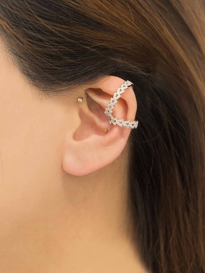 Boucles d'oreilles directionnelles pour la vente par Lovoda