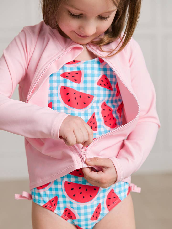 Kids Pink Long Sleeve Full Zip Rash Guard for wholesale on Faire