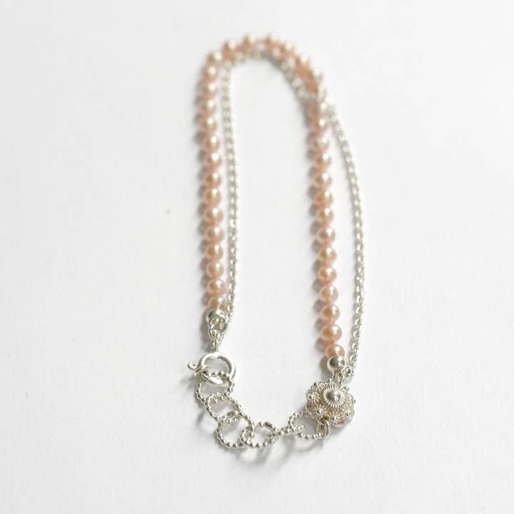 Bracciale nodo Zeeland con perle rosa per la vendita all'ingrosso da parte di Hester Zagt Sieraden