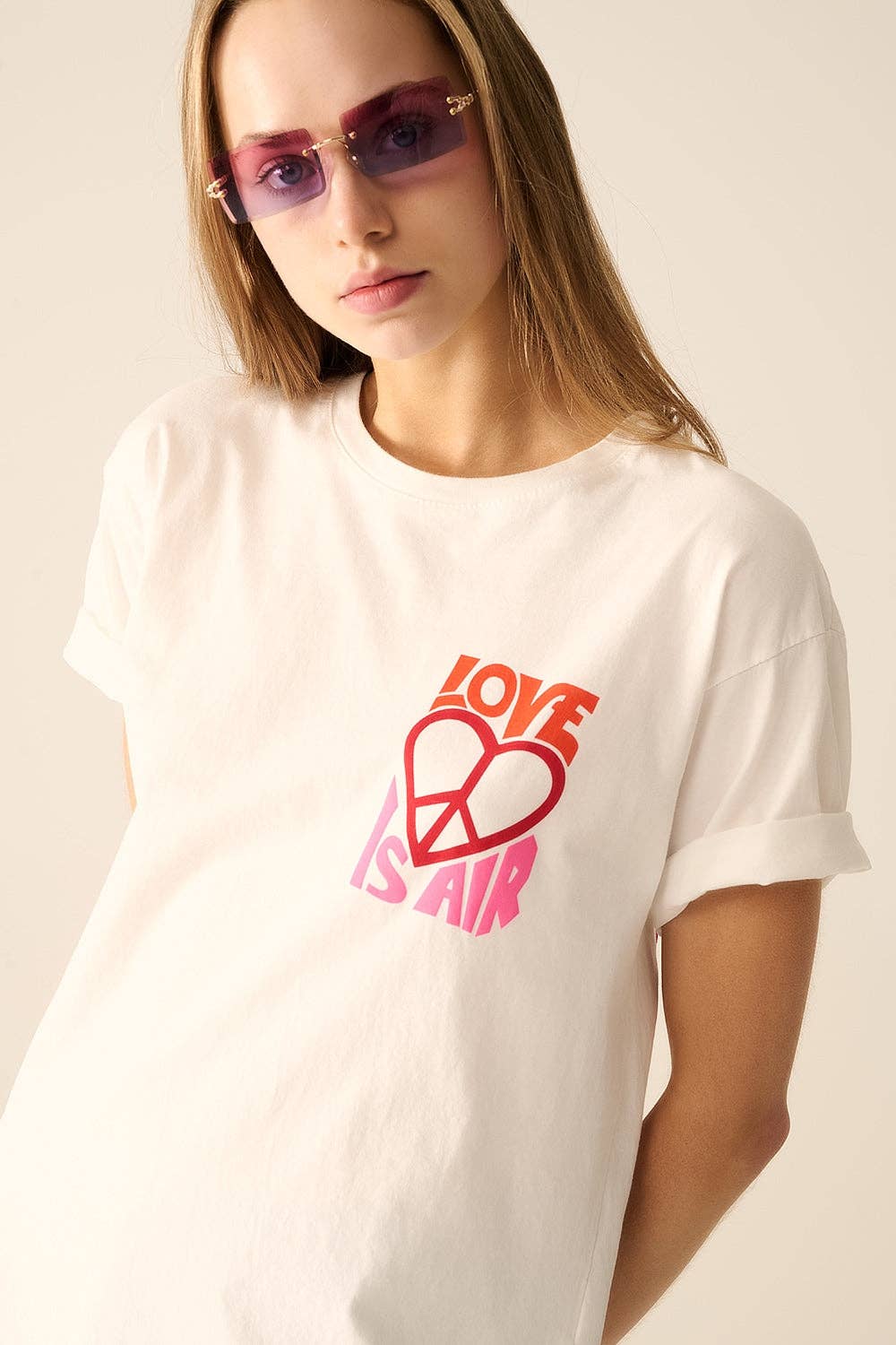 White T-Shirt with Love is Air and Heart with Peace logo for wholesale on Faire2