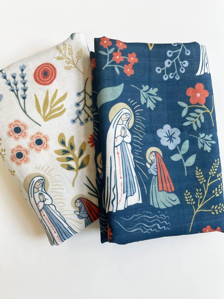 The Stump of Jesse - Wholesale Swaddle - Baby - Our Lady of Lourdes & St. Bernadette Deluxe Swaddle Catholic