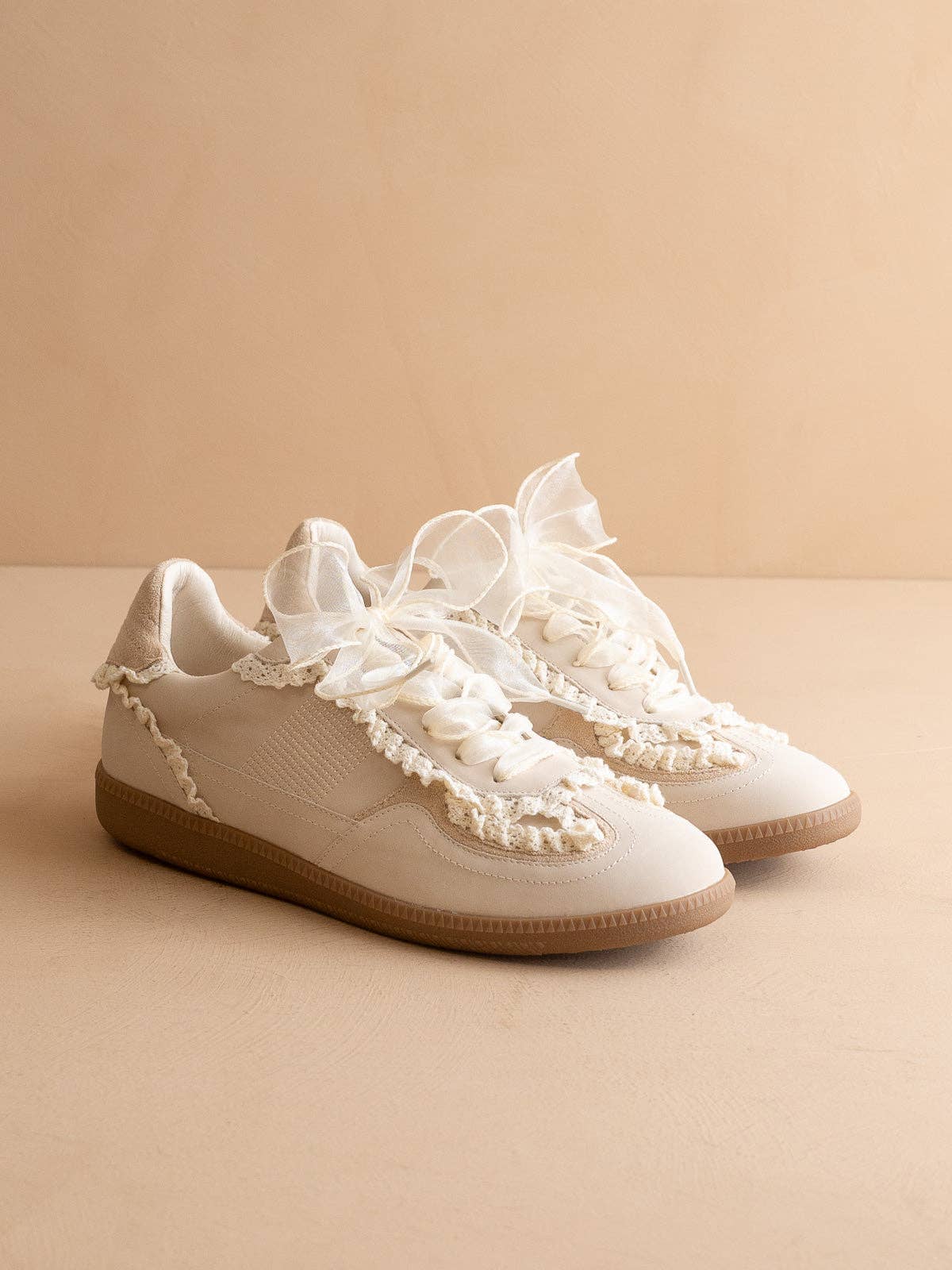 The April | Cream Lace-Trimmed Retro Sneaker for wholesale on Faire4
