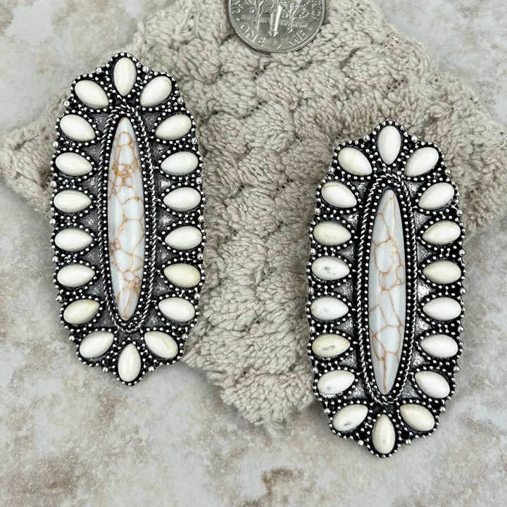 Western Elite Jewelry - Vente Boucles d'oreilles pendantes - Boucles d'oreilles pendantes ovales en argent avec pierres blanches0