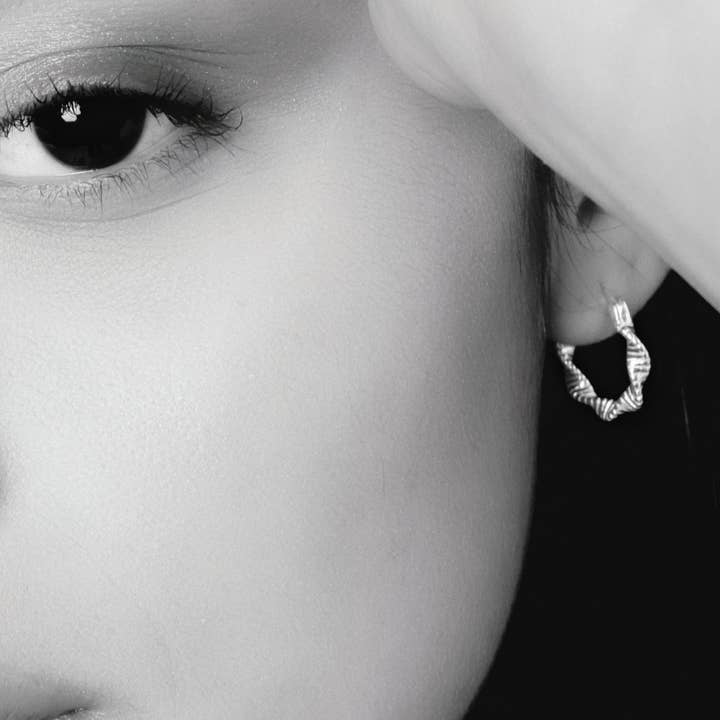 Twisted Flower Möbius Sterling Silver Hoop Earrings for wholesale by Moclein