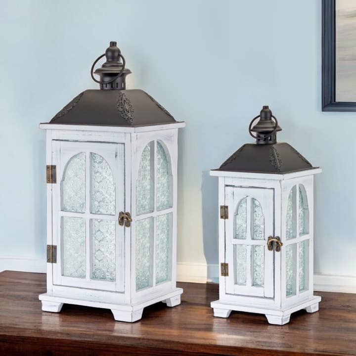 Set di 2 portacandele in vetro bianco e nero, legno e metallo per la vendita all'ingrosso da parte di HomeRoots