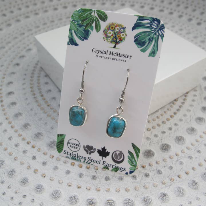 Blaue und schwarze Wirbel baumeln Edelstahlohrringe für den Großhandel von Crystal McMaster Jewellery Designer