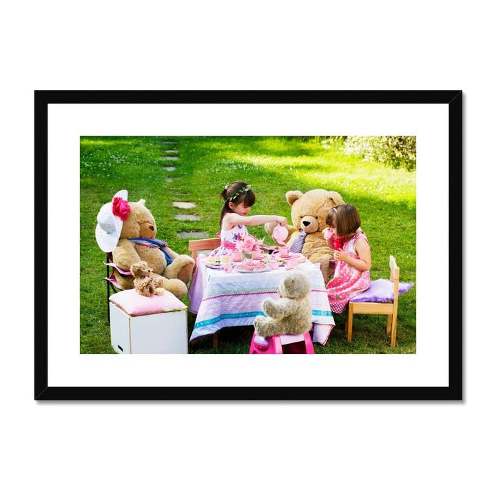 Sisters playing teddy bear picnic Framed & Mounted Print for wholesale by Sorbey