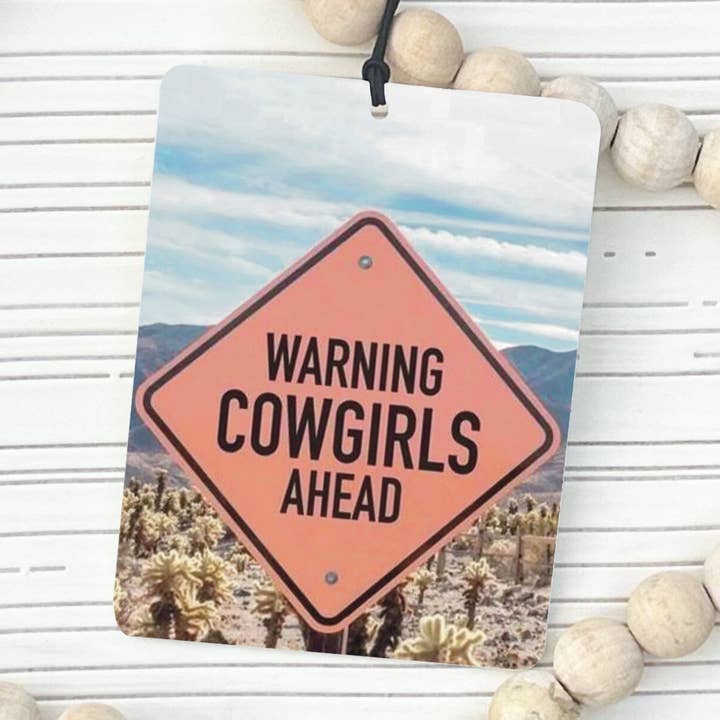Warning: Cowgirls Ahead Car Air Freshener for wholesale by Print + Press Design & Apparel