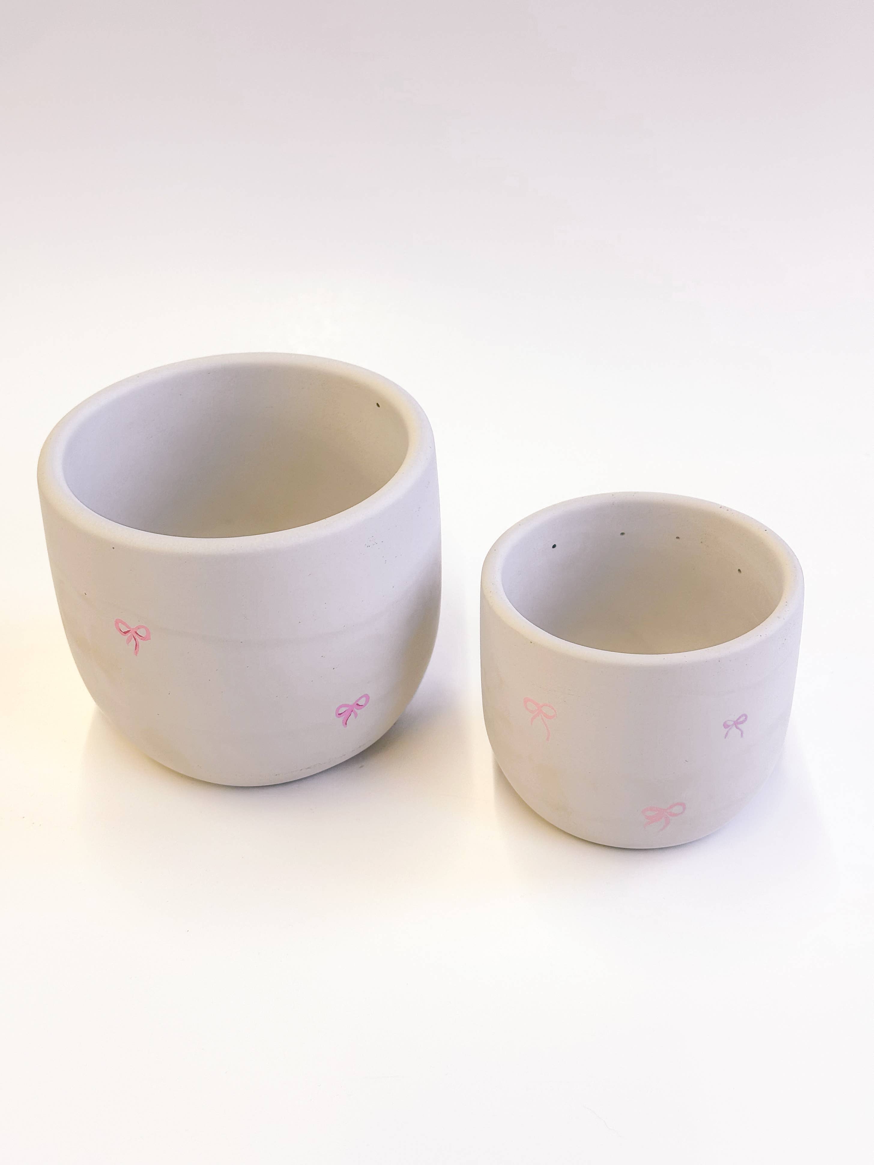 The Plant Supply - Wholesale Plant Pot - Pink Bow Concrete Planter With Drainage Hole4