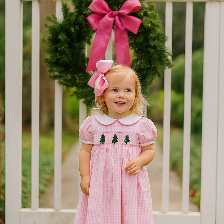Pink checks Christmas trees hand smocked girl's dress and other Purchase Wholesale marco. Free Returns & Net 60 Terms on Faire trending on Faire.