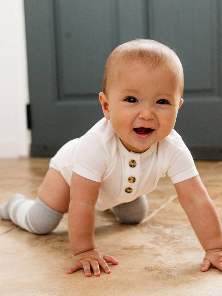 Bamboo Short Sleeve 3 Button Onesie for wholesale by Snuggle Shield™