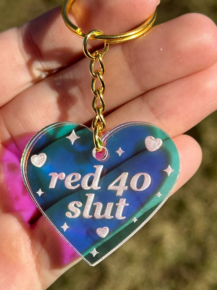 Red-40 Slut Iridescent Acrylic Keychain for wholesale by ShlemonArt
