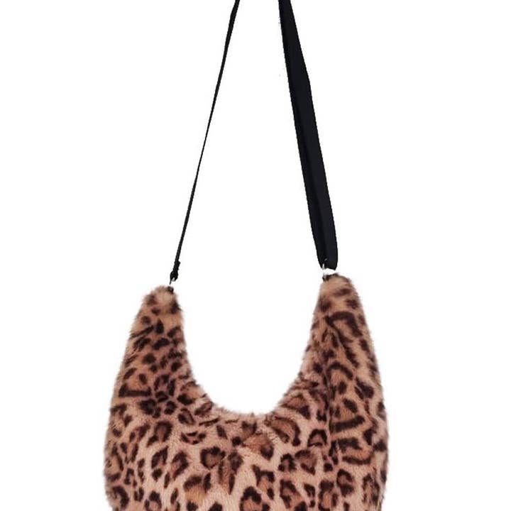 LEO SIMONE SLOUCH BAG EM LEOPARDO para venda a revendedores na Faire