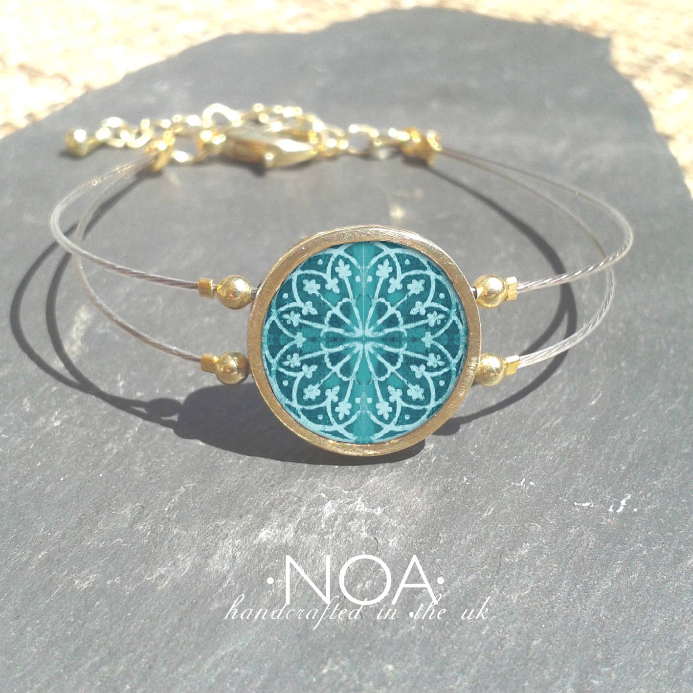 Noa Jewellery – wholesale Charm/dangle bracelet – Round Ceramic Bracelet, Gold Plated Stainless Steel Frame5