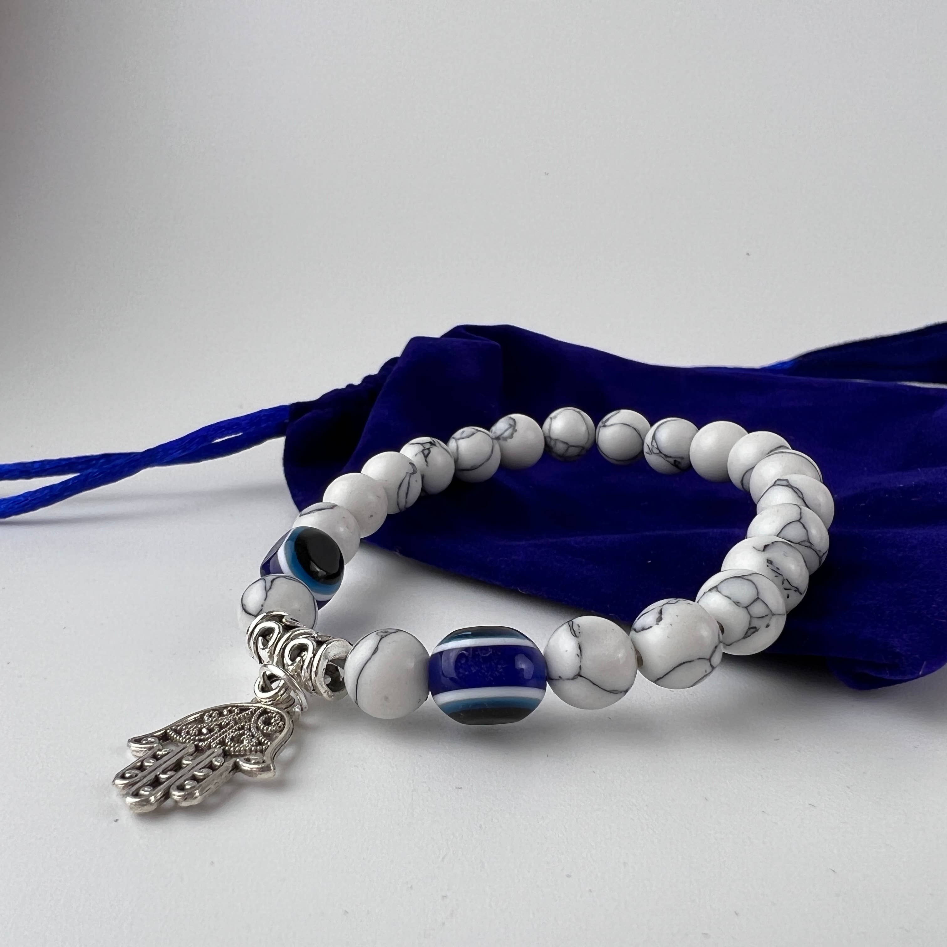 GREENROOTS USA LLC – wholesale Charm/dangle bracelet – Hamsa Hand Evil Eye W/ Howlite Bracelet W/ Velvet Bag1