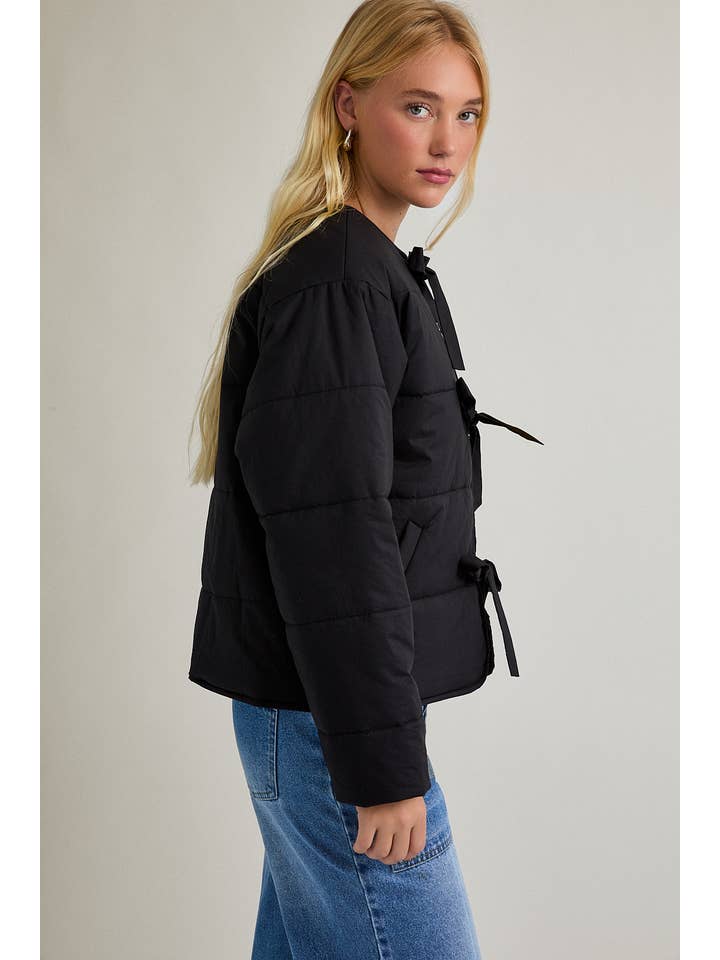 Black PUFFER JACKET WITH RIBBON TIE ON THE FRONT for wholesale on Faire2