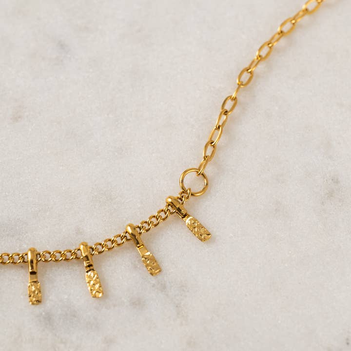 Gold Cyrus Necklace for wholesale on Faire