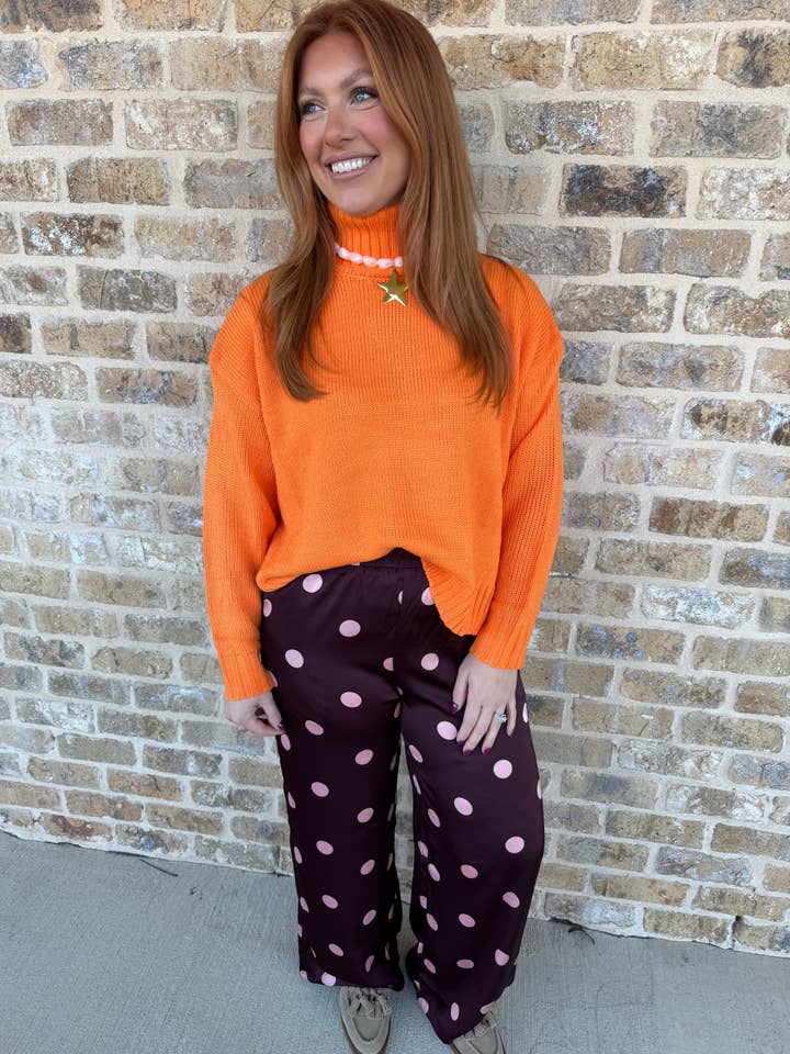 CALÇAS BURGUNDY COM BOLINHAS ROSA por atacado de Triple Play Jewelry