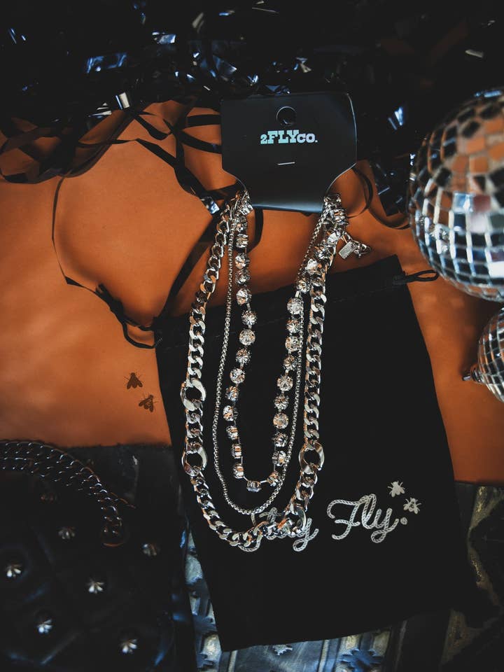 TOO FLY 4 U *WHITE LIGHTNING and other Purchase Wholesale two left feet. Free Returns & Net 60 Terms on Faire trending on Faire.