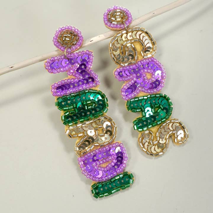MULTI BRINCOS PENDENTES COM MISSANGAS MARDI GRAS | 91E5319 para venda a revendedores na Faire0