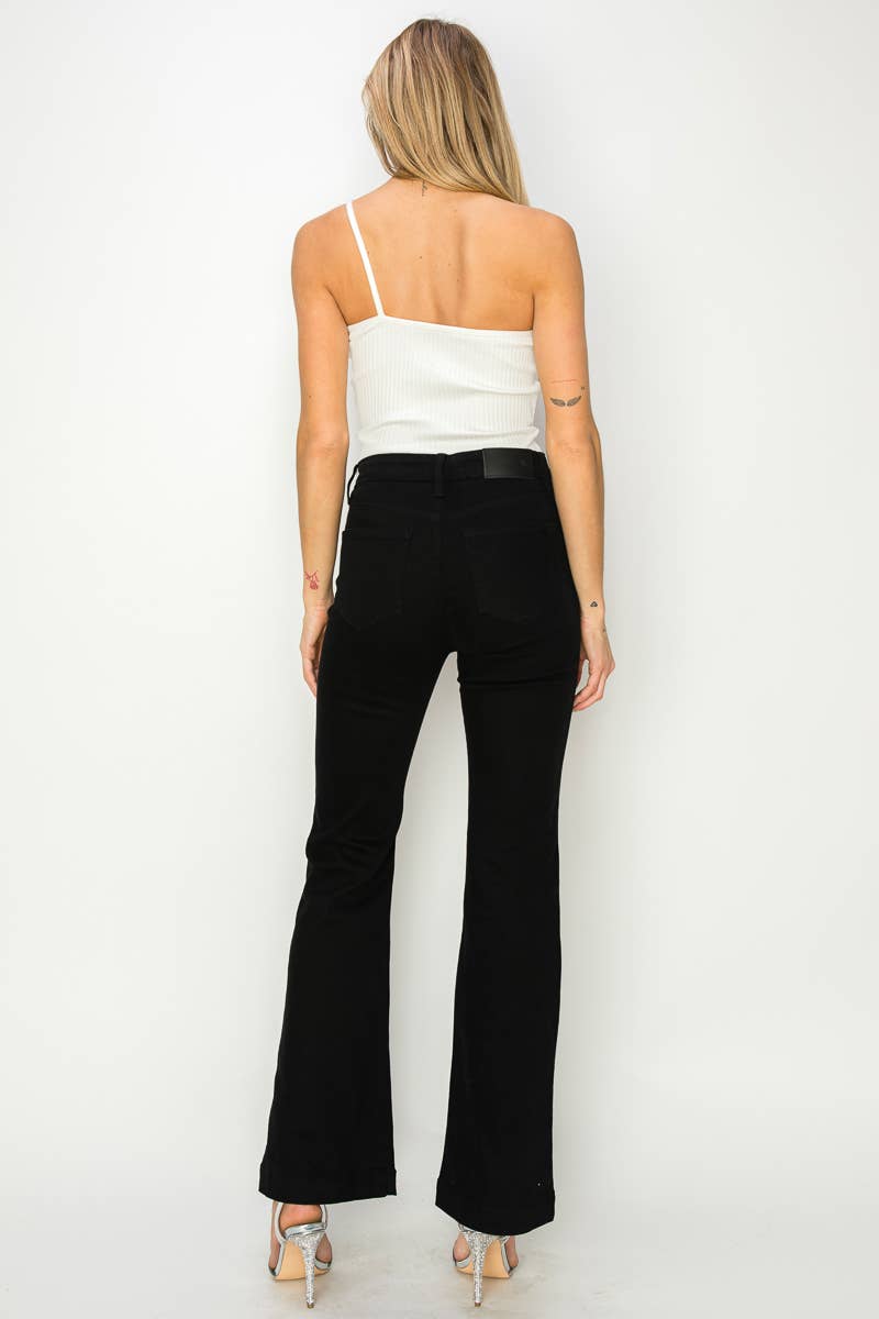 SVART HÖGA UTSVÄNGDA SVARTA JEANS MED KORSANDE DEKORATIONER för wholesale på Faire3