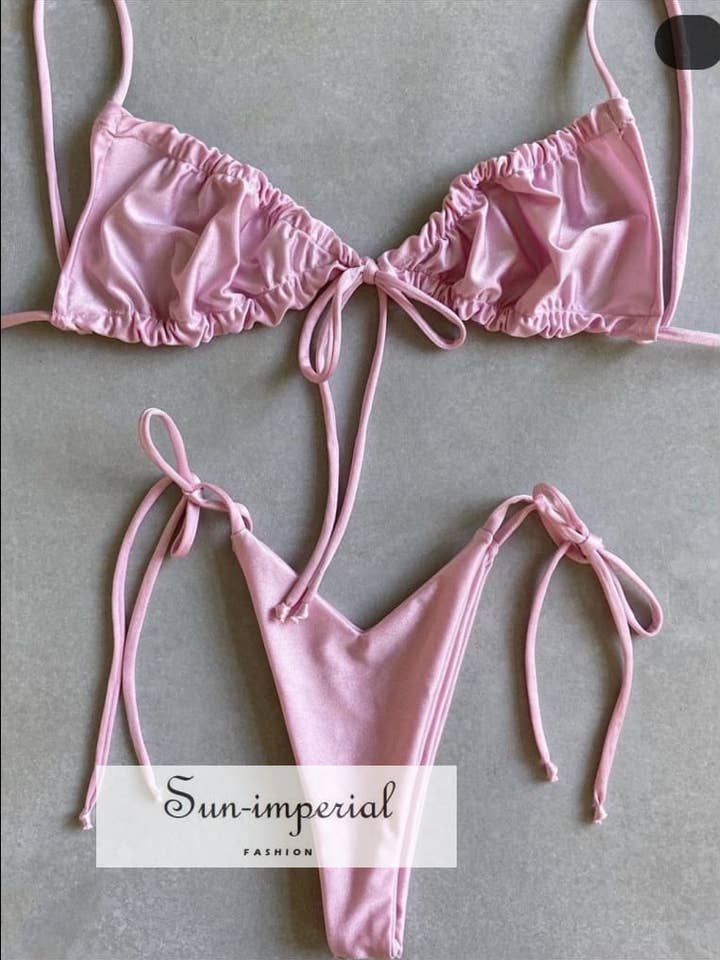 Dames effen lichtroze ruches badpak met stropdas aan de zijkant en voor wholesale door Sun Imperial