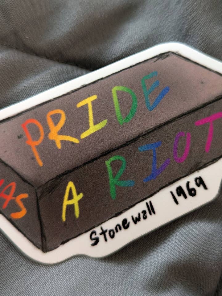 Pride was a Riot Brick Sticker for wholesale by Sapphic Space