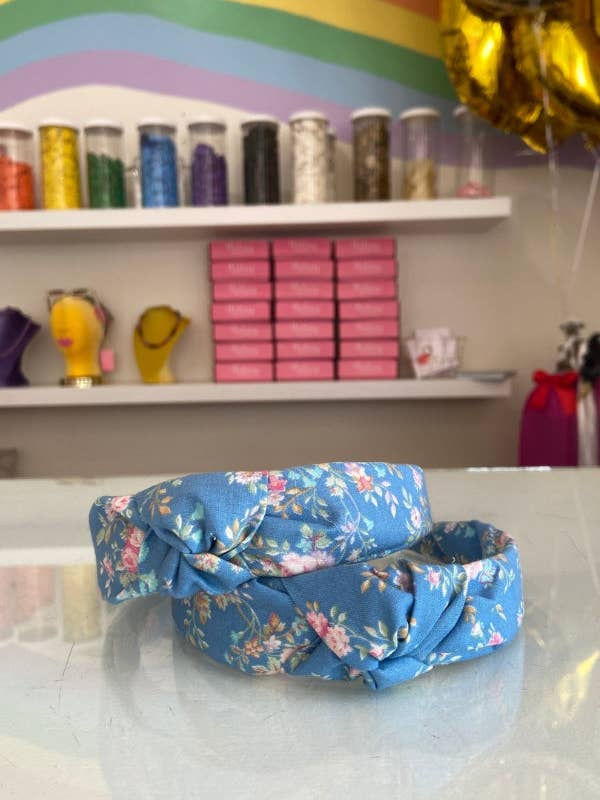 The Tiny Tassel Headband in Light Blue Floral for wholesale by The Tiny Tassel