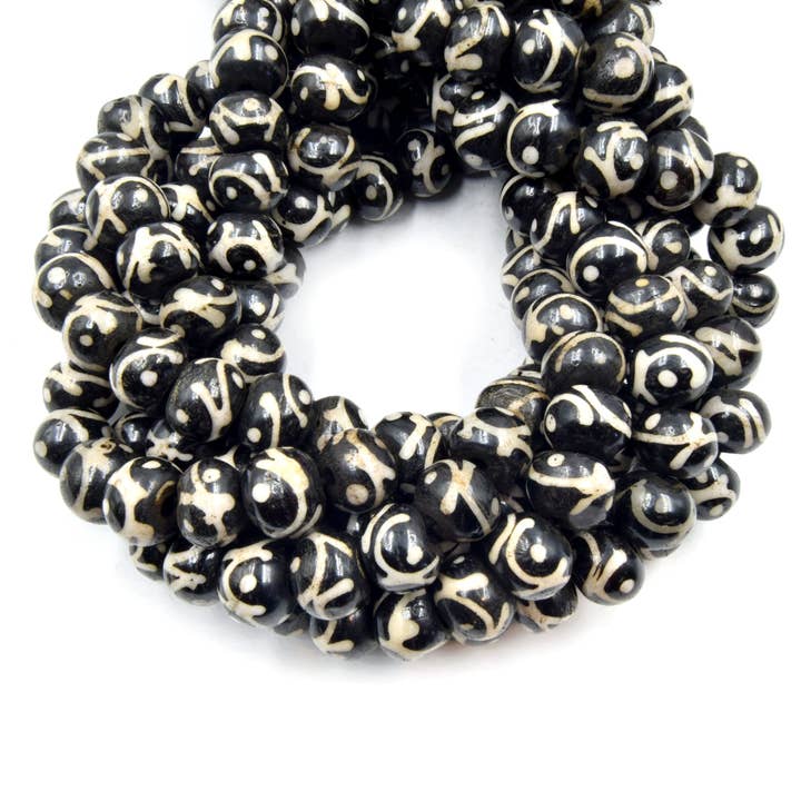 Batik Ox Bone Rondelle Beads | Swirl with Dot Pattern for wholesale by Only Beads