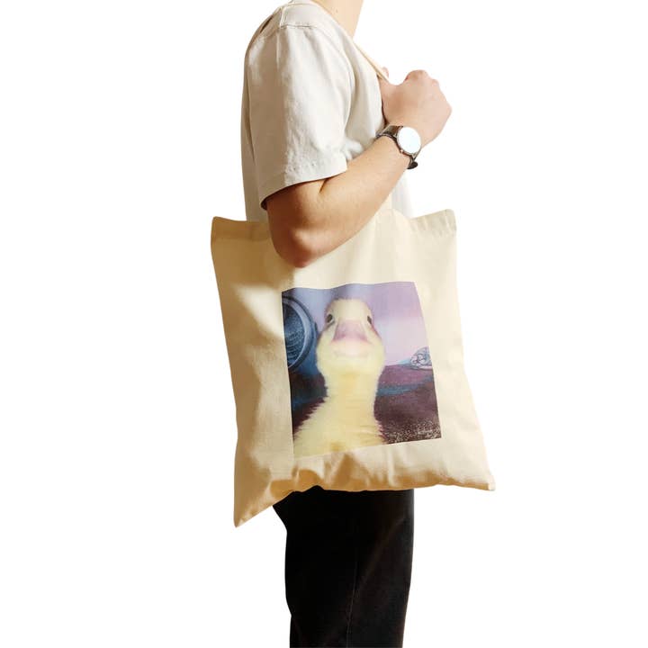 Duck Stare Funny Meme Tote Bag Staring Into Your Soul Iconic for wholesale by ZZZEBRAAA LIMITED