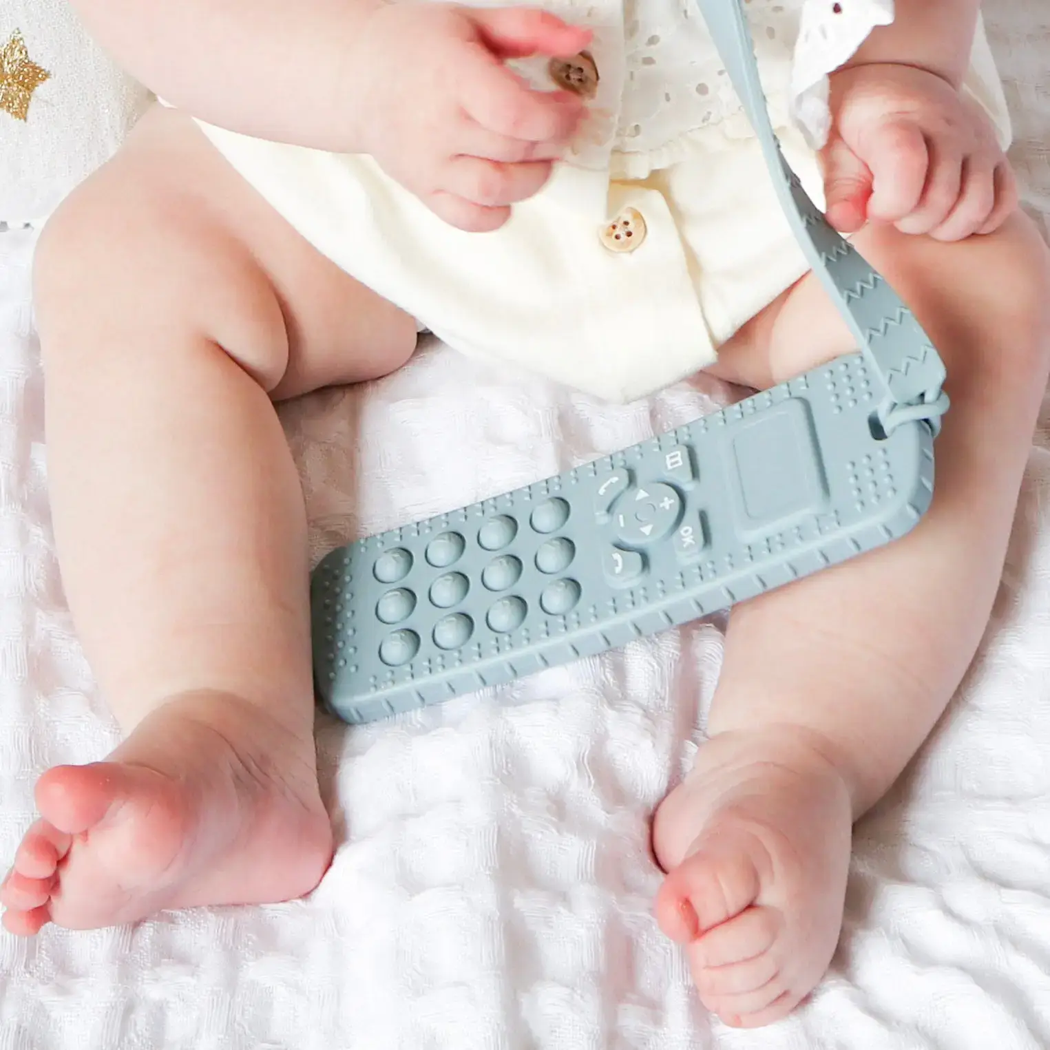 Sensory Popper Teether Phone - Dusty Pink for wholesale on Faire13