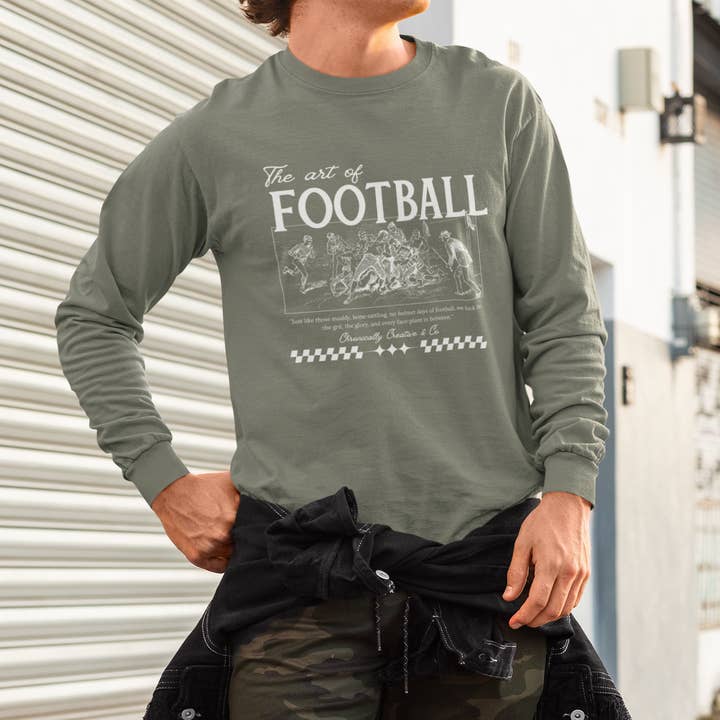 „The Art of Football“ langærmet T-shirt fra Chronically Creative & Co. - Vintage sportsstil for engroshandel hos Chronically Creative & Co.
